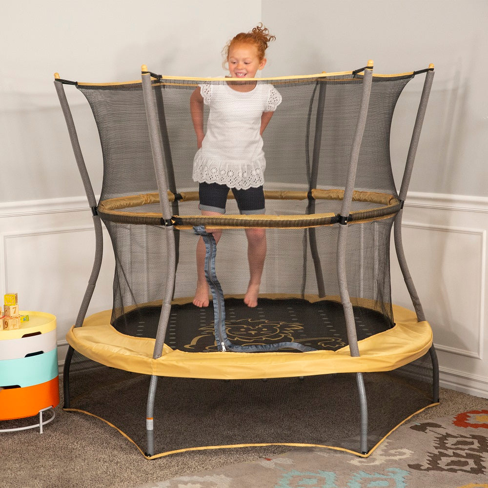 Skywalker Safari Explorer mini trampoline showing 360-degree padded handlebar in yellowish-orange and full enclosure net surrounding the jump area