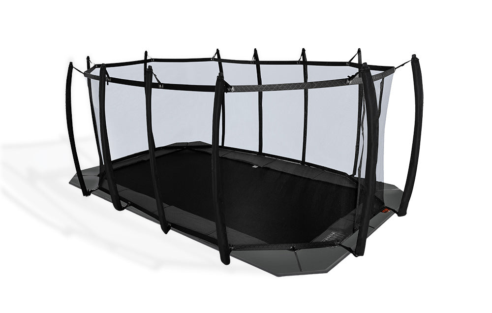 Avyna Pro-Line 10x17 in-ground trampoline shown with the optional safety enclosure fitted, which is sold separately and not included with this model